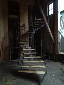 <p>Interior stairs WDSTCK,<em> Wood, Steel &amp; Rope</em></p>