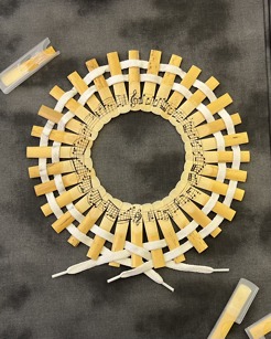 <p><em>When I Hear Music</em></p>
<p>Clarinet Reeds, Shoelaces, Ink</p>
<p>2024</p>