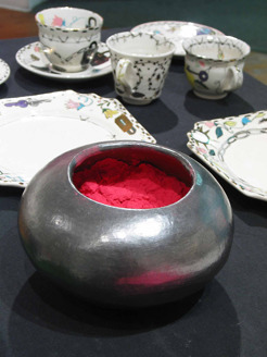 <p><span>"A South African Tea Party"(2004-2012) &nbsp;(detail) Ceramic tea set, tea pot, embroidery on vintage fabrics, silk &nbsp;and metal thread, acrylic paint on mylar and &nbsp;plaster cups and bund cakes. Size variable.</span></p>